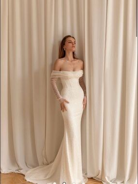 Off-Shoulder Ivory Sequin Mermaid Bridal Gown